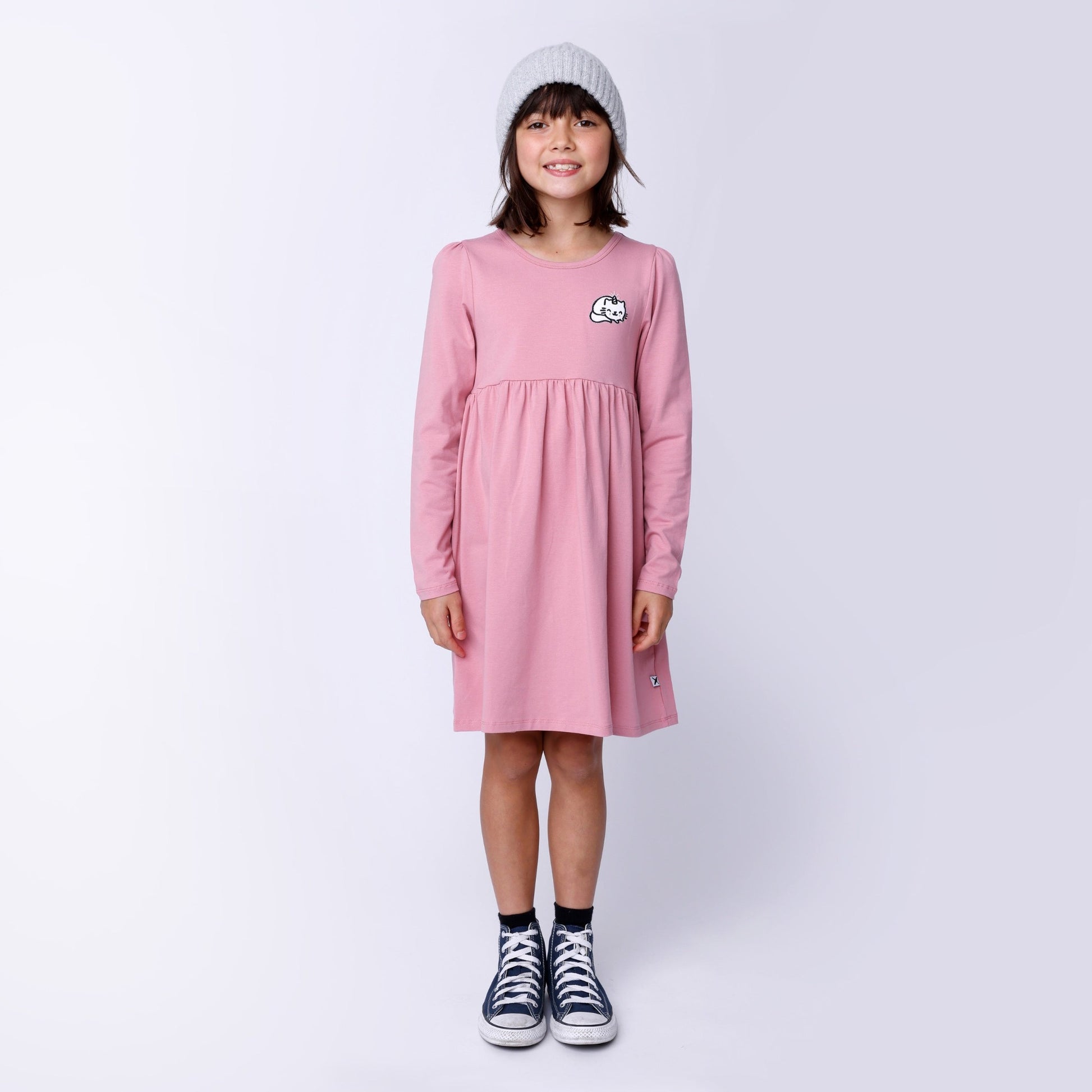 Pink Dress with small unicat print patch on top left shoulder. Long sleeves. 