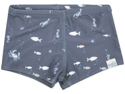 Swim short with blue base and sea creature print and tie waist. 